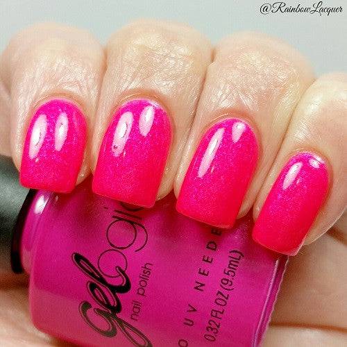 dark pink nail polish on nails